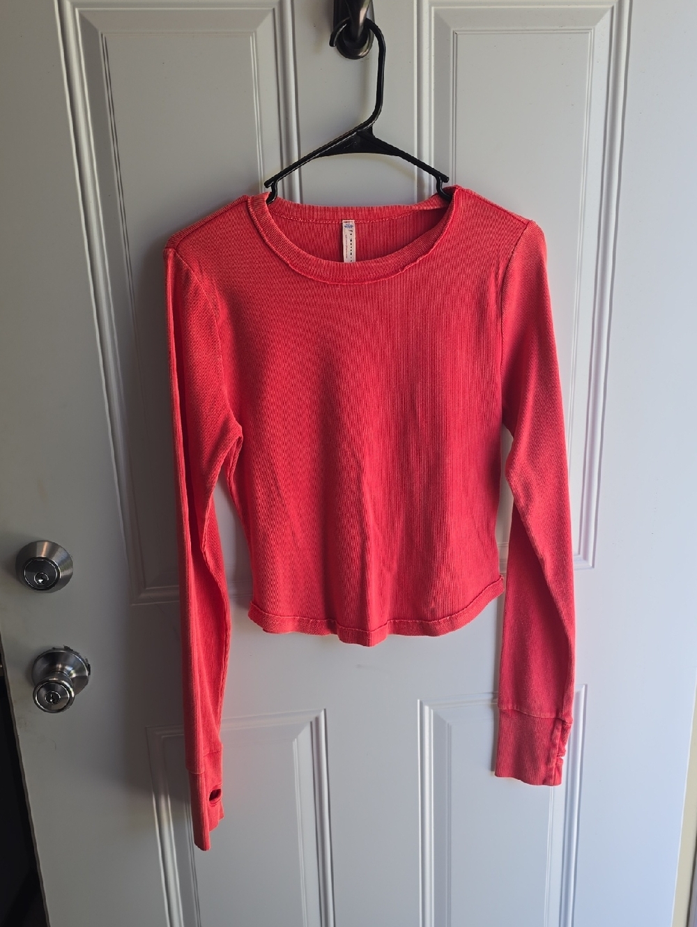 8. Free People Movement Long Sleeve Ribbed Baby Tee in Electric Sunset